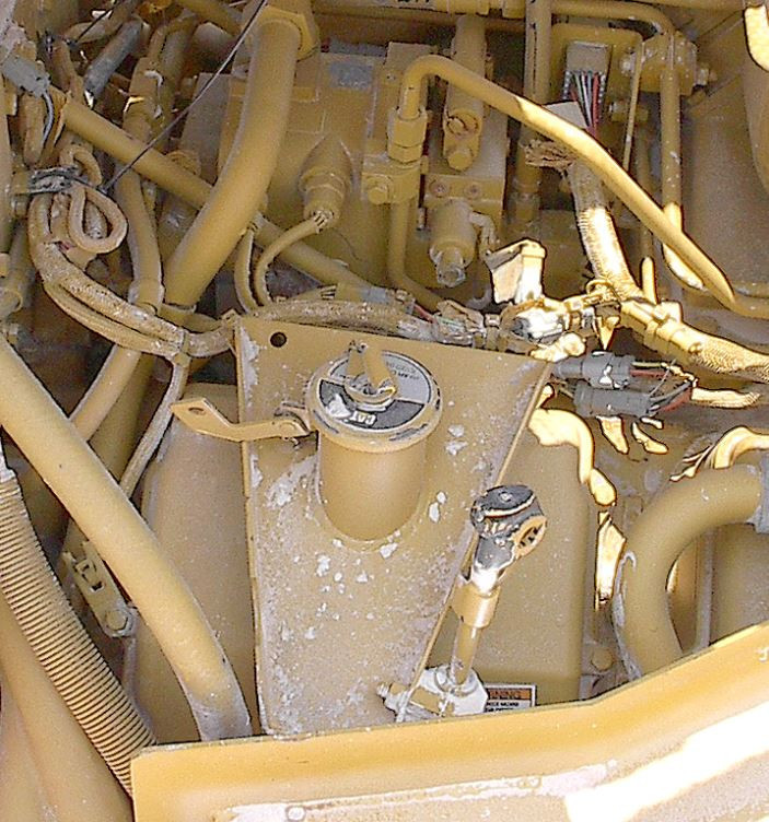 Close up of a dozer engine and transmission.