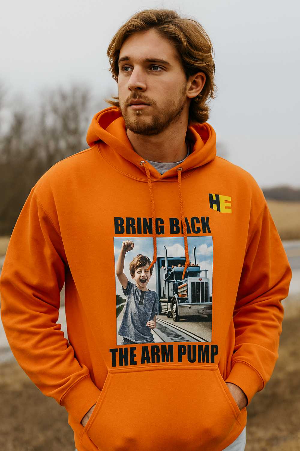 Man wearing a Orange "Thank a Trucker" hoodie with the HeavyEquipment.com logo on the front.